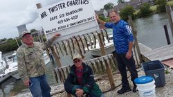 Three people fishing at Oak Harbor