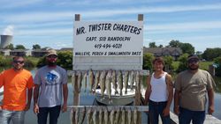 Four people fishing in Oak Harbor