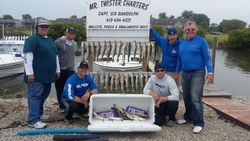 Group of 6 people fishing in Oak Harbor