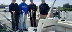 2 fishers with their catch at Oak Harbor