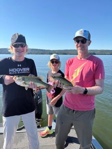 A group of 3 people fishing for Florida Bass in Guntersville