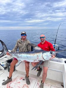 Swordfish caught by two people on Dauphin Island