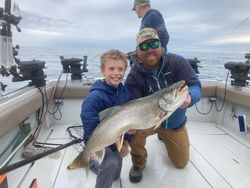 Family time catching some Big Lake Trout ! 