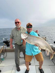 Two people fishing in NY
