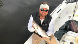 A fisherman with a spotted weakfish catch in NC