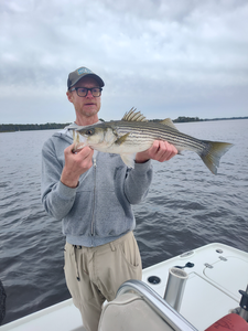 Nice striped bass on light tackle! Clear conditions made for an exciting day on the water.