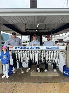 Four people enjoying cruises and fishing in East Chicago