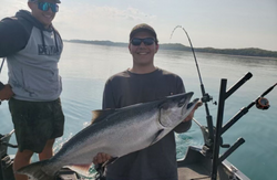 Two people fishing on cruises and fishing trips in East Chicago