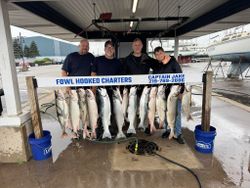 Ten coho salmon, rainbow trout, and lake trout caught during a fishing and cruises trip in East Chicago