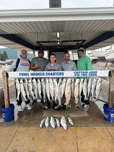Five people on a fishing and cruises trip in East Chicago