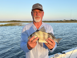 Nice black drum caught using light tackle in Port O'Connor! Clear skies made for perfect fishing conditions.