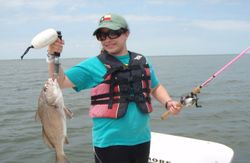 A person fishing in TX