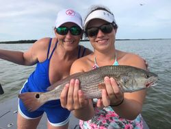 Two people fishing in Port O'Connor