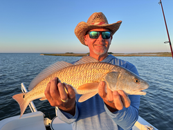 Nice redfish using light tackle and bait casting in Port O'Connor today!