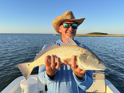 Nice redfish caught trolling in Port O'Connor! Clear skies made for perfect fishing conditions.
