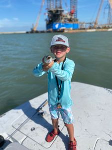 Angler with fishing rod standing in Rockport