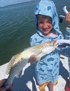 Fisherman with a catch at Rockport