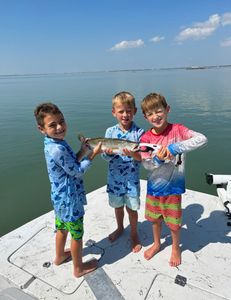 Three people fishing in Rockport