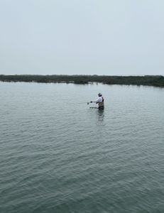 A person fishing in Rockport