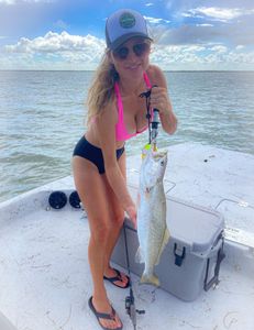 A lone fisherman in Rockport enjoys the outdoor sport of fishing and hunting.