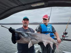 Anglers fishing on the shores of OK