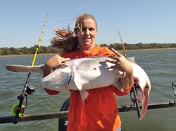 Person fishing on the banks of Sand Springs