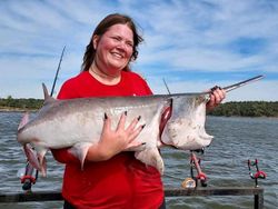 Angler holding a 23-inch fish in OK