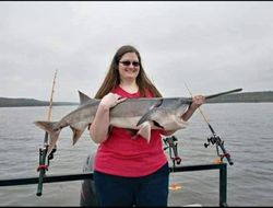 One person fishing on the sand in Sand Springs