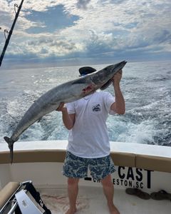 Reeling in Wahoo Fishing In Charleston.