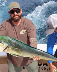 Photo of a person fishing in South Carolina with cruises and fishing gear