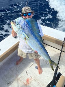 Angler holds a 22-inch fish during a fishing cruise in Charleston