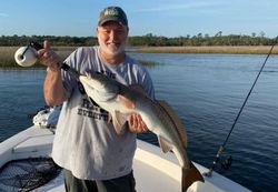 Angler with a 21-inch catch at Jacksonville Beach