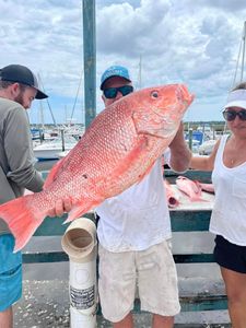 Two people fishing at Jacksonville Beach