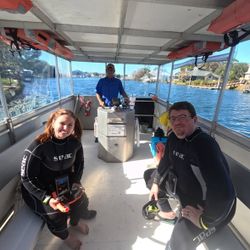 Three people enjoying water sports in FL