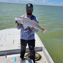 All smiles! Inshore Fishing for Redfish
