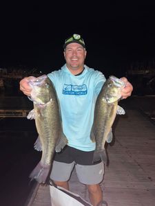 Two largemouth bass caught while fishing in MO