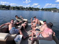 Four people enjoying a fishing tour in Osage Beach
