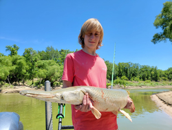 A person fishing in Cayuga
