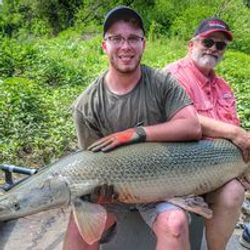 Two people fishing at Cayuga