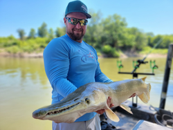 A person fishing in TX