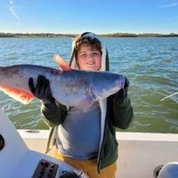 Angler holds a 23-inch fish in TX