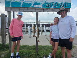 Blasted through a school of Spotted Weakfish and Redfish on a partly cloudy day with afternoon rain in Port Aransas, TX!