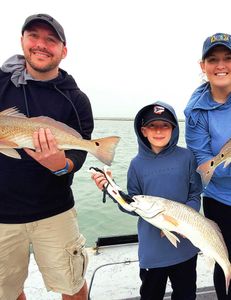 2 anglers fishing in Port Aransas