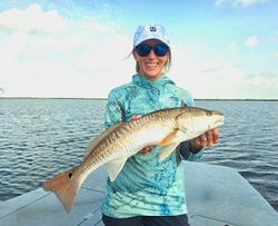 A person fishing in Port Aransas