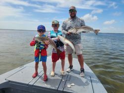 2 big fish caught by 3 people in Port Aransas