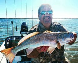 One fisherman with a big 25-inch fish in TX