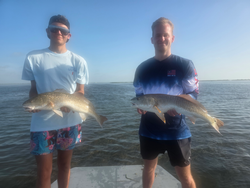 Double redfish delight: Light tackle triumphs in Port Aransas!