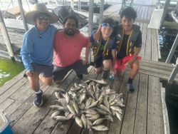 4 people fishing in Plano