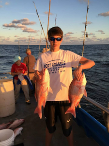 Two anglers with a big 51-inch catch at Port Aransas