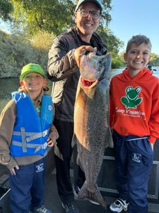 Three people fishing at Granite Bay